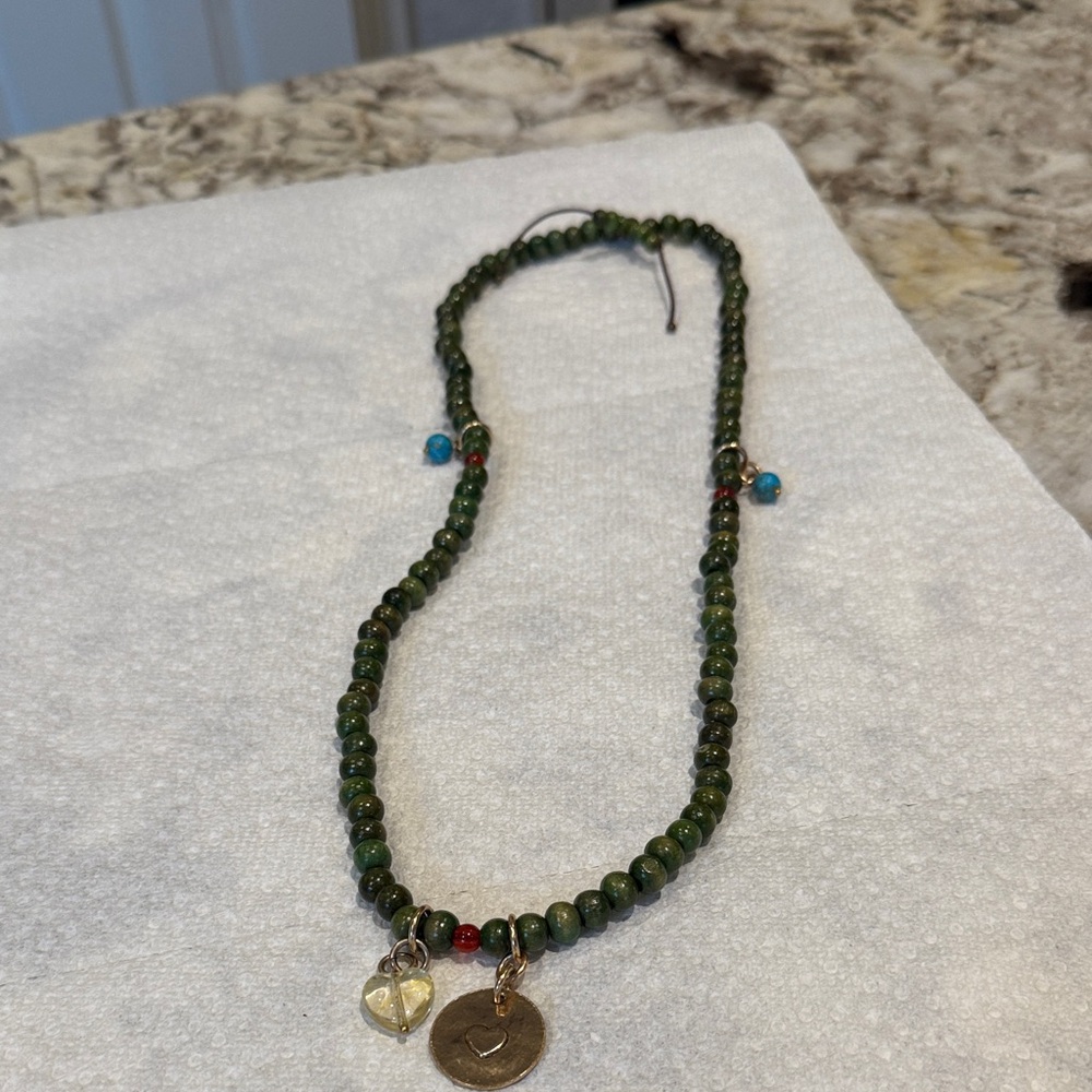 Green Beaded Necklace with Gold and Blue Accents